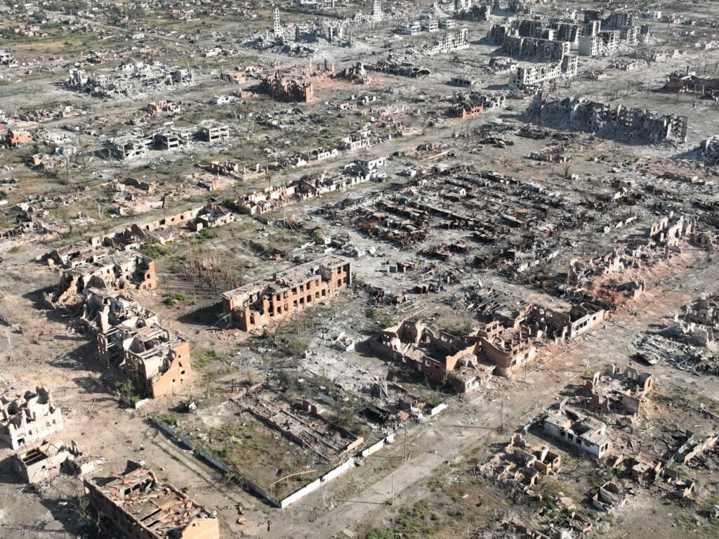 an aerial view of a destroyed city